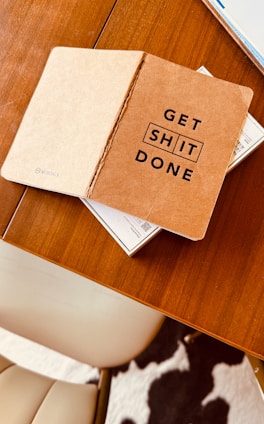 a book sitting on top of a wooden table