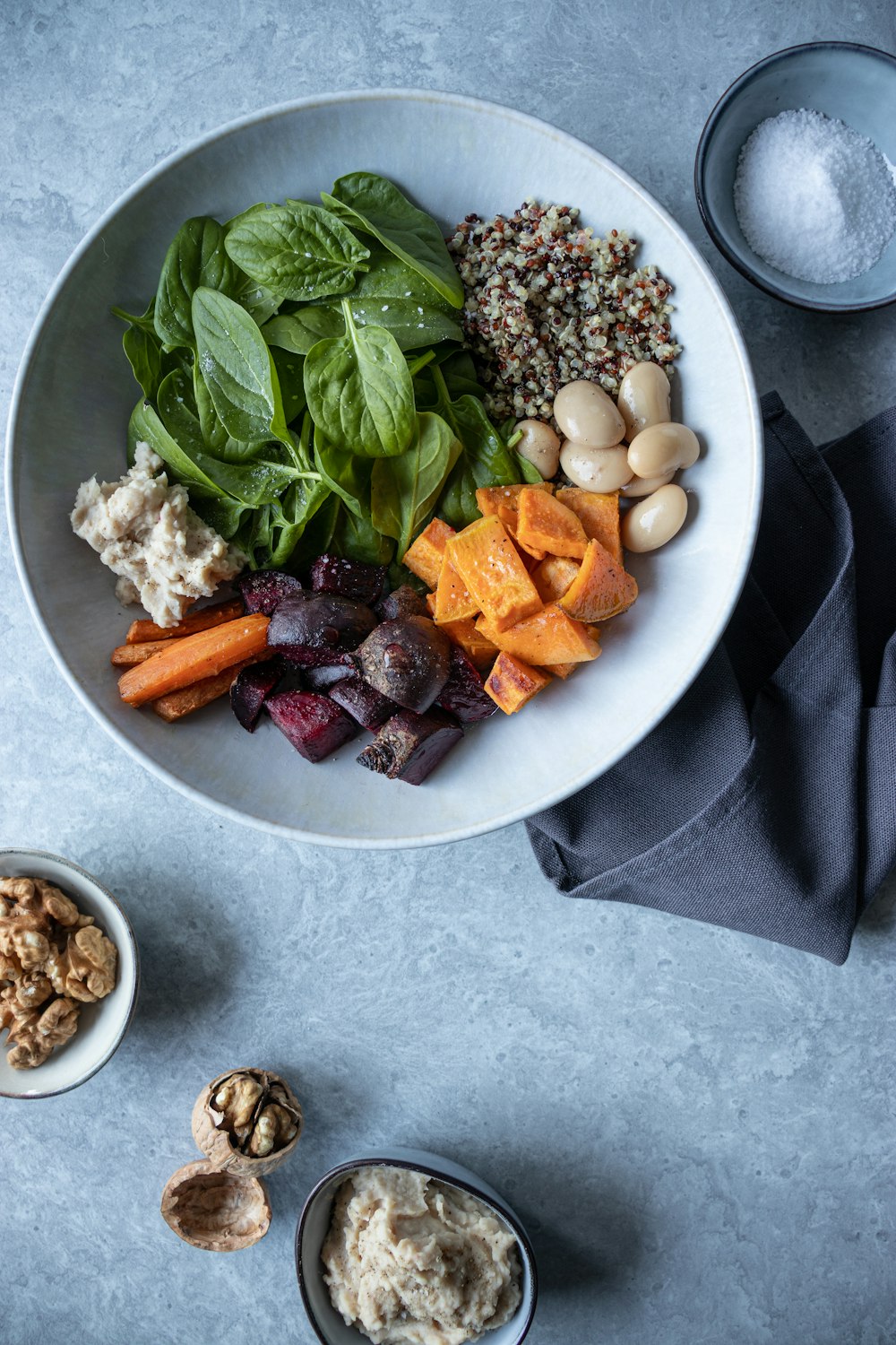 a white bowl filled with different types of food