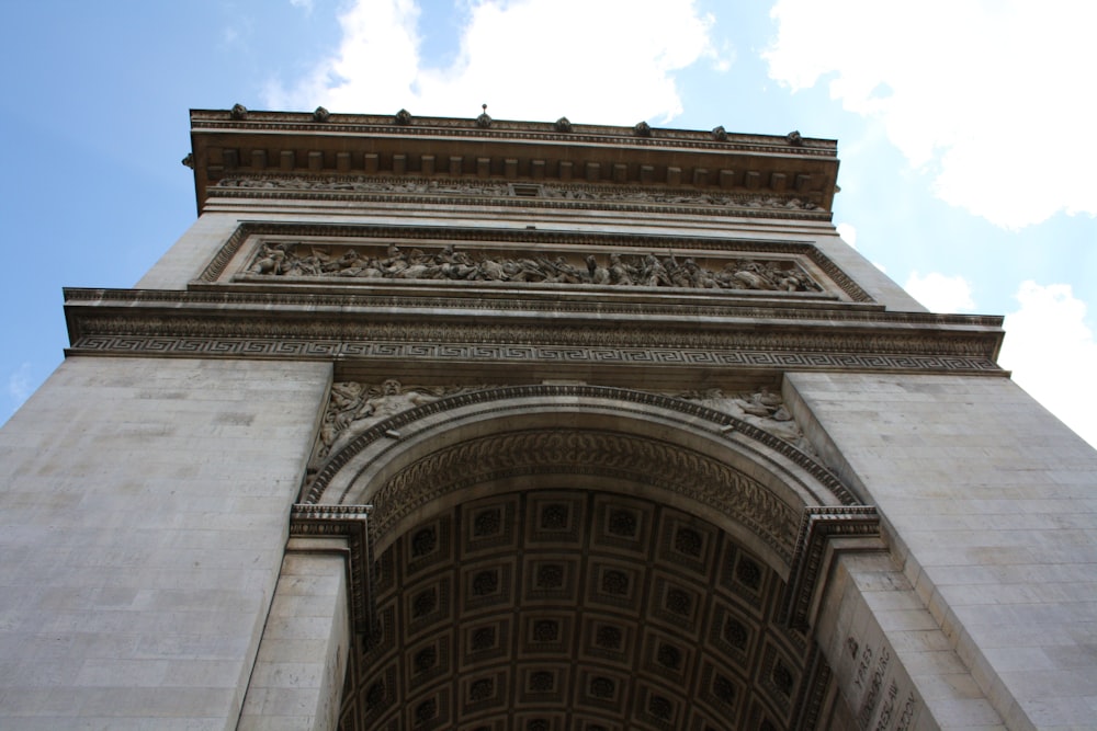 a tall tower with a clock on the top of it