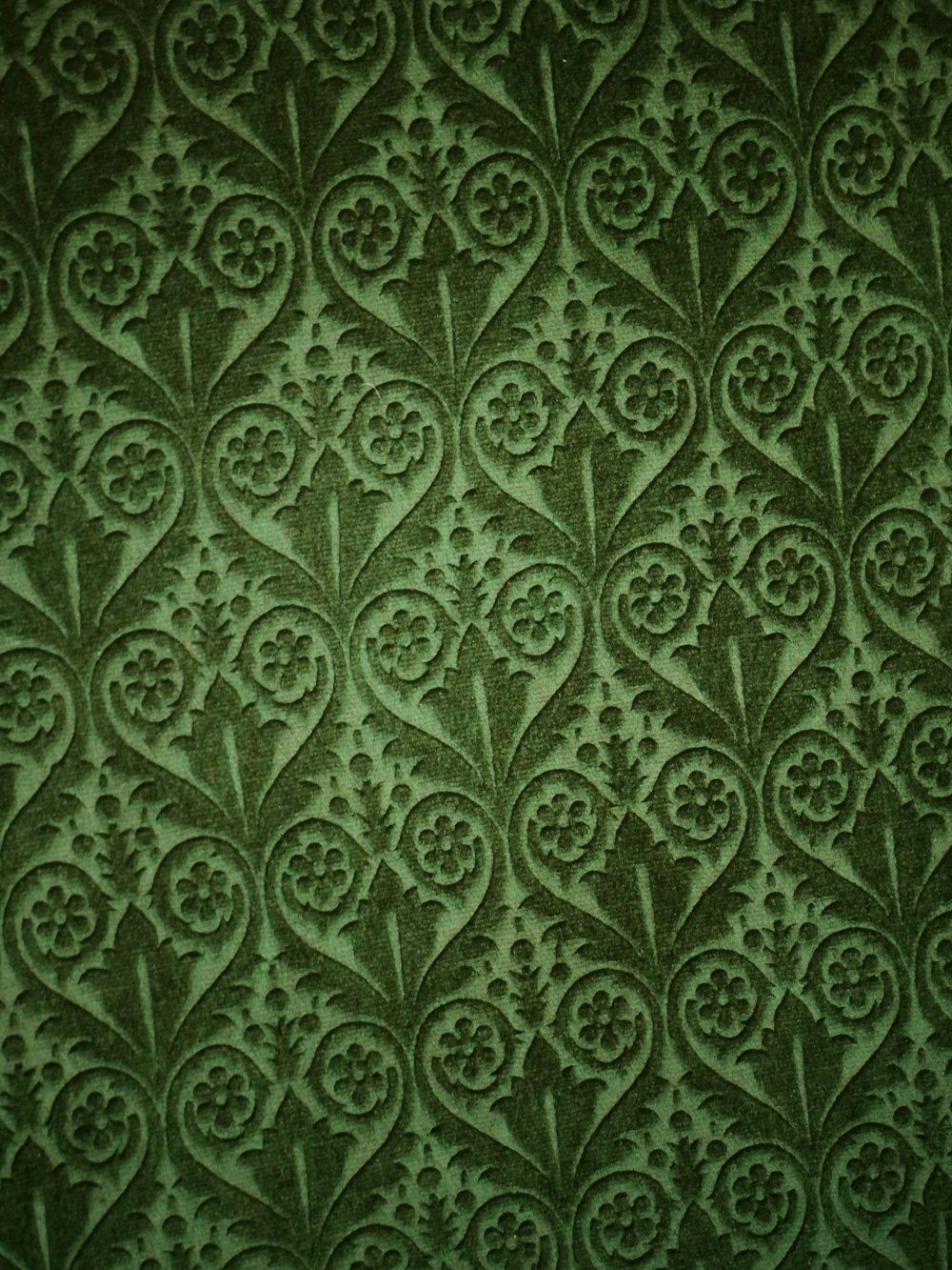 um close up de uma parede com um padrão sobre ela