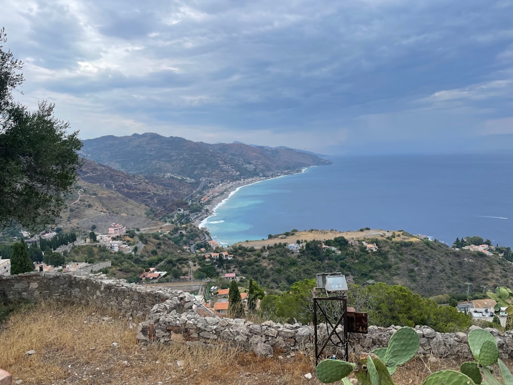 a view of the ocean from a hill top