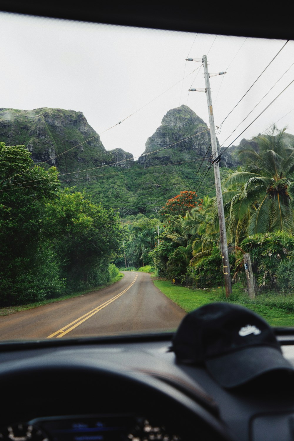 a view from inside a car of a mountain road