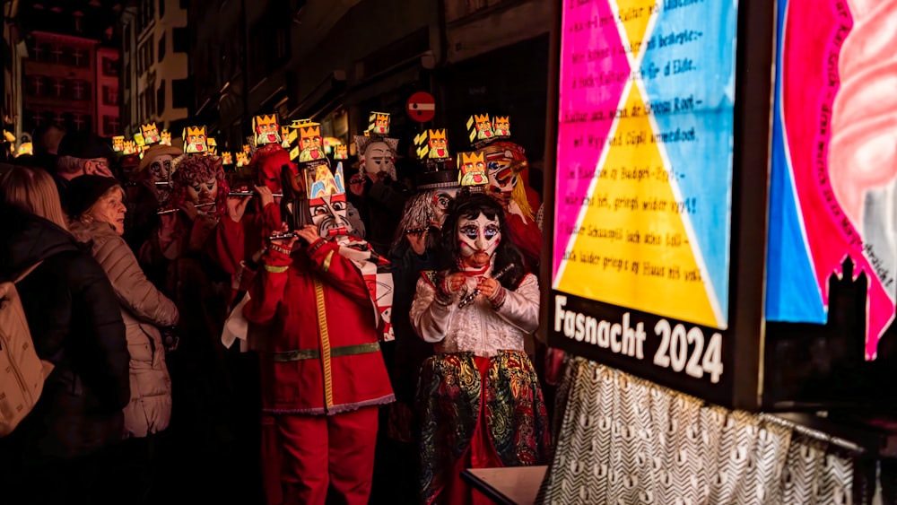 a group of people dressed in costumes standing next to each other