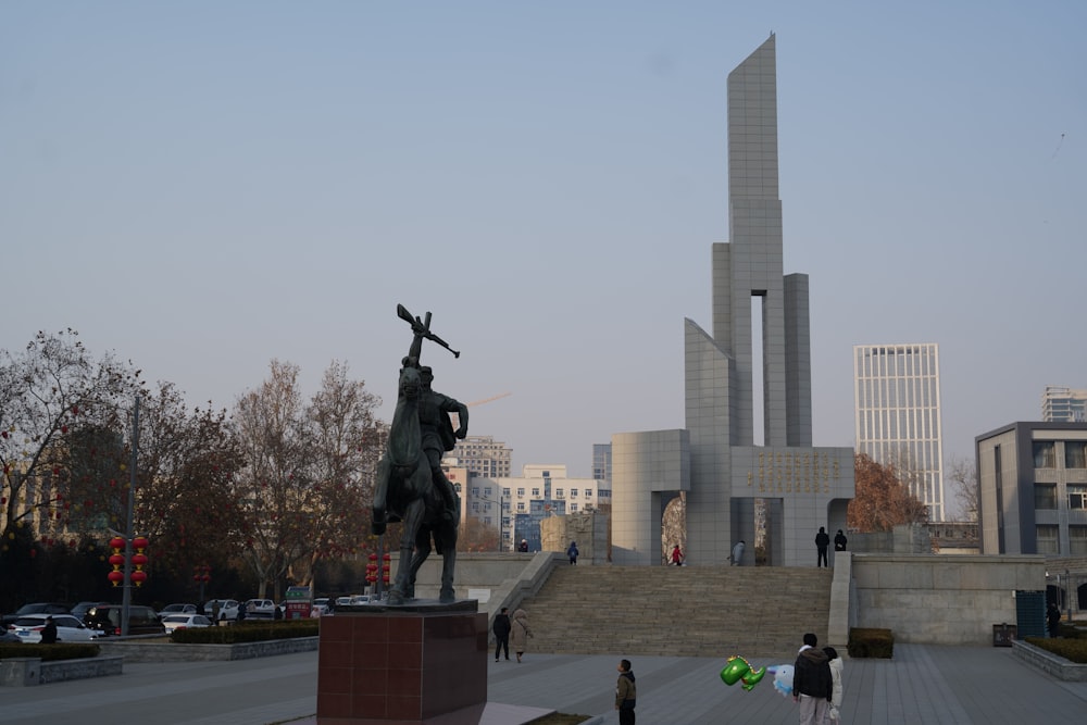 a statue of a man with a cross on his shoulder