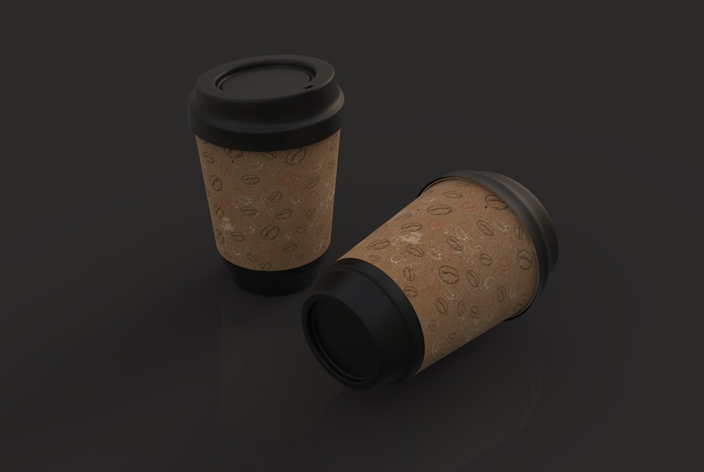 a couple of coffee cups sitting next to each other