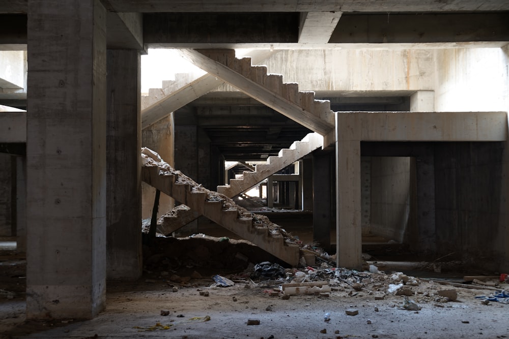 a bunch of rubble in a building with stairs