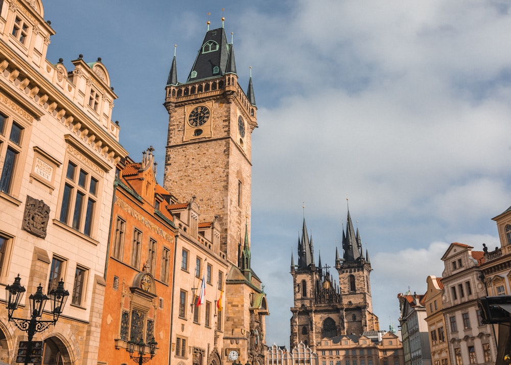 a tall clock tower towering over a city