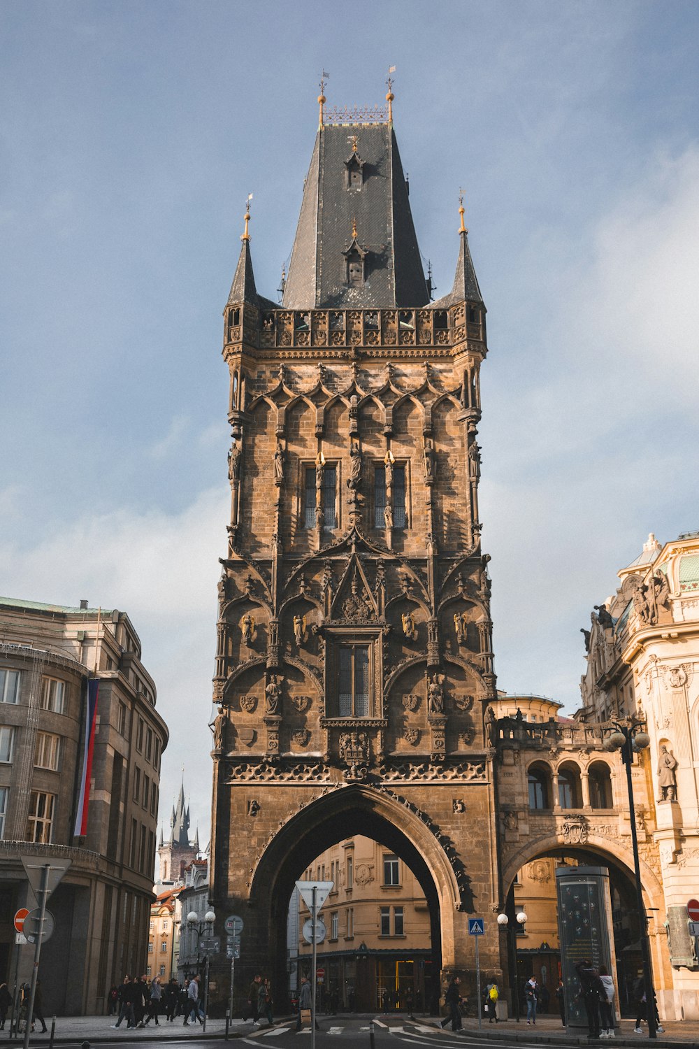 a tall tower with a clock on the top of it