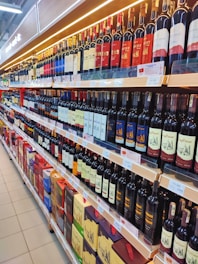 a store filled with lots of bottles of wine