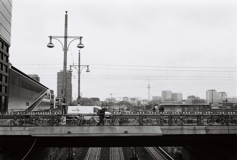 a black and white photo of a train track