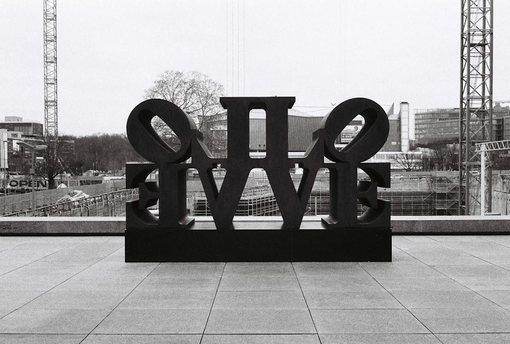 a black and white photo of the word love