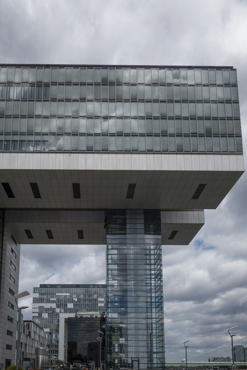 a tall building with a sky background