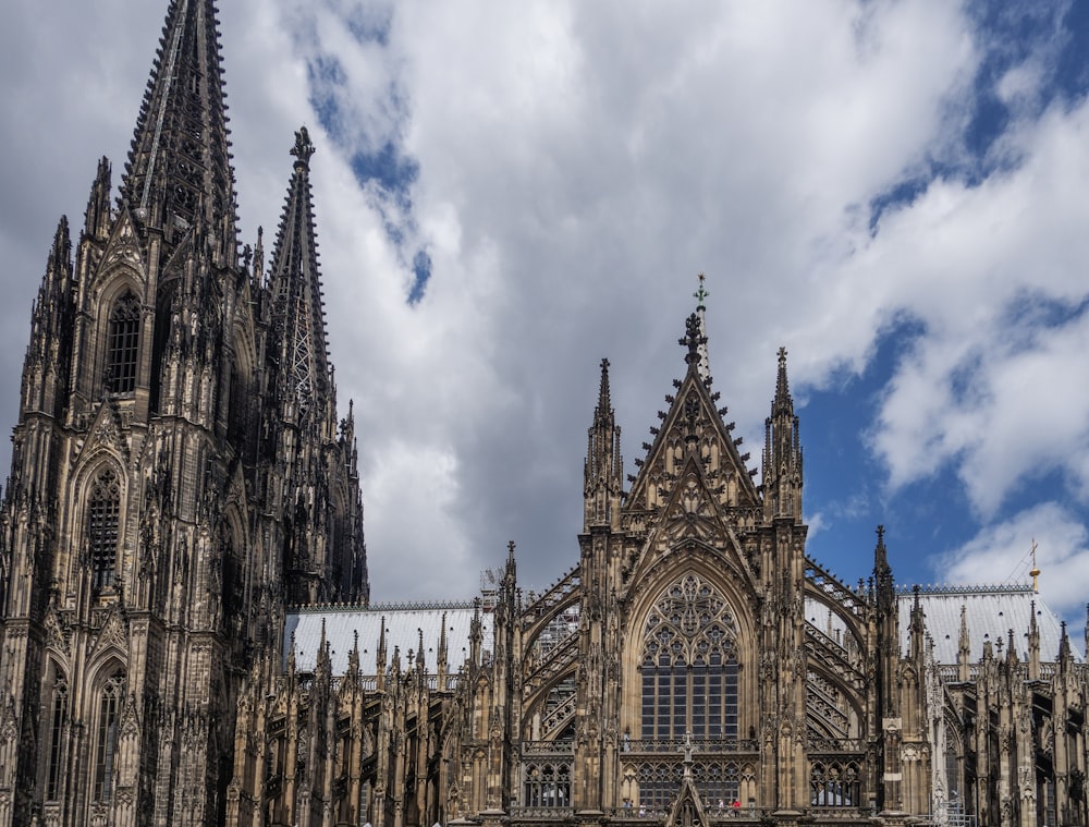 a large cathedral with a clock on the front of it