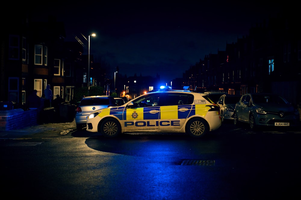 a police car parked on the side of the road