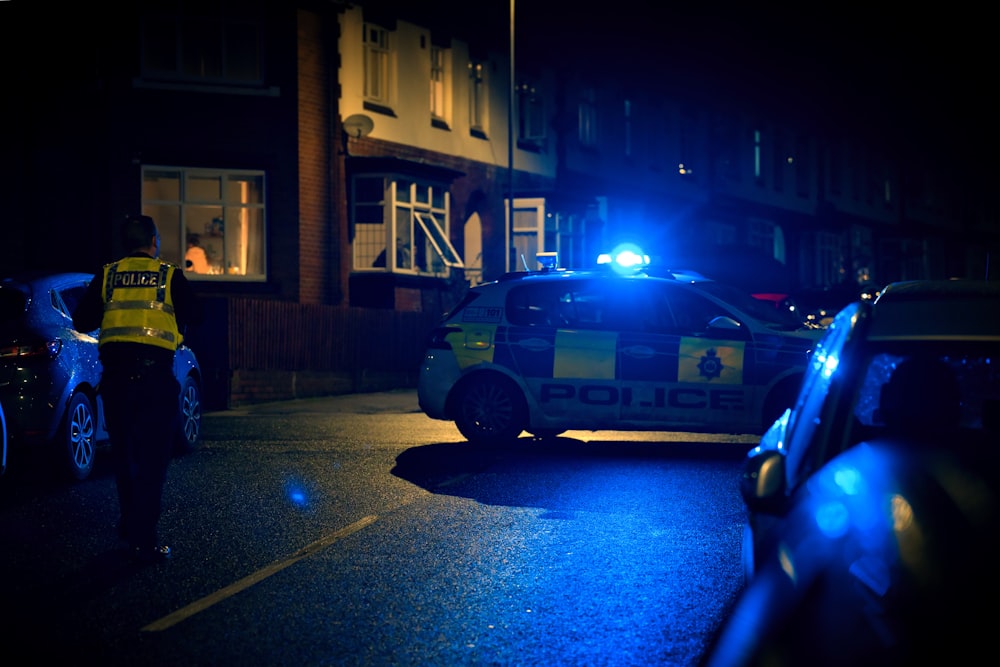 a police car parked on the side of the road