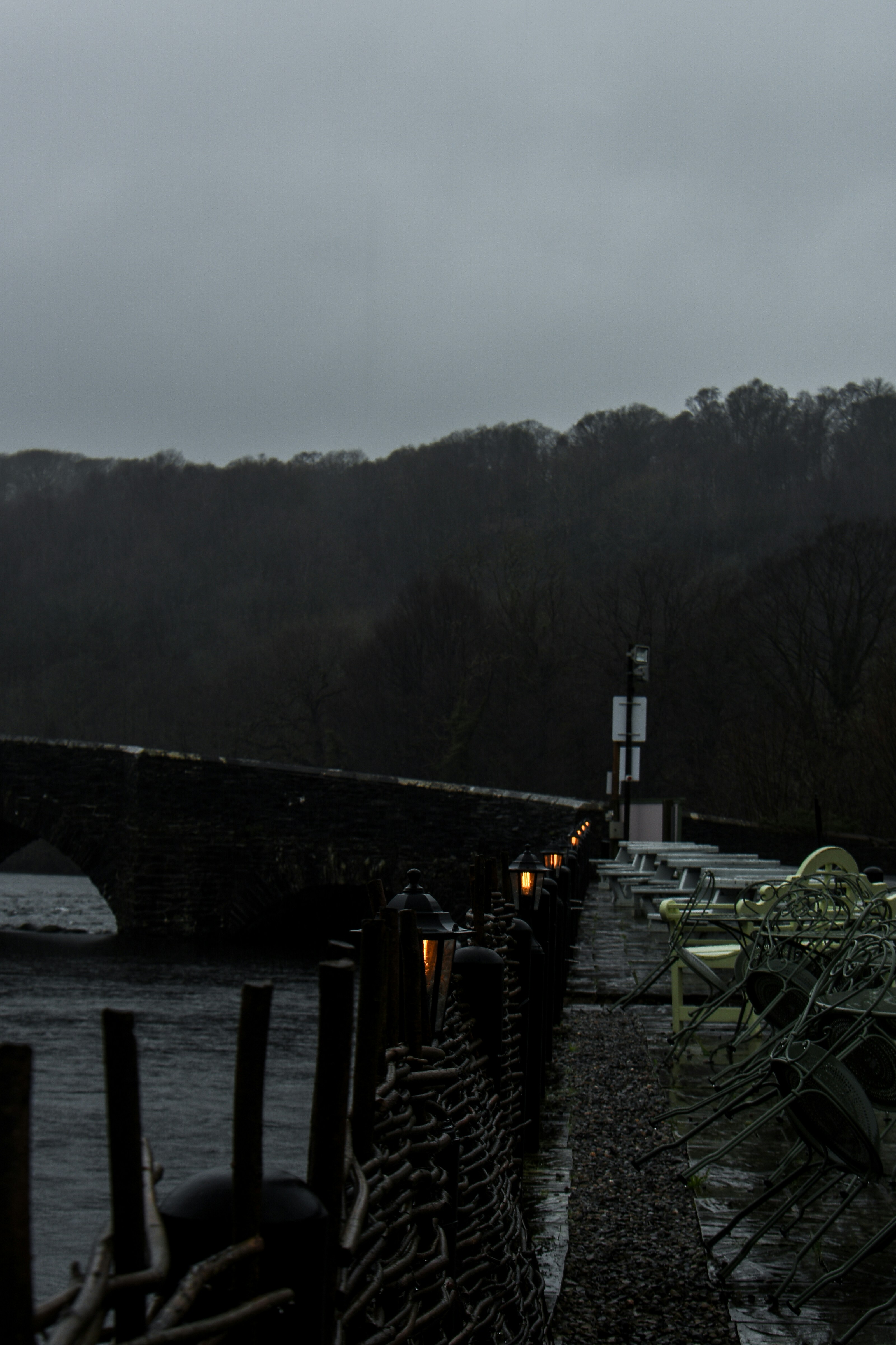 a stone bridge over a body of water