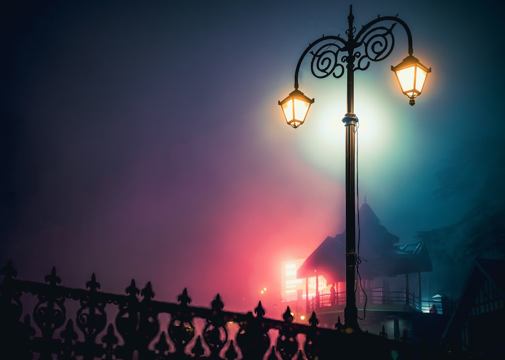 a street light on a foggy night