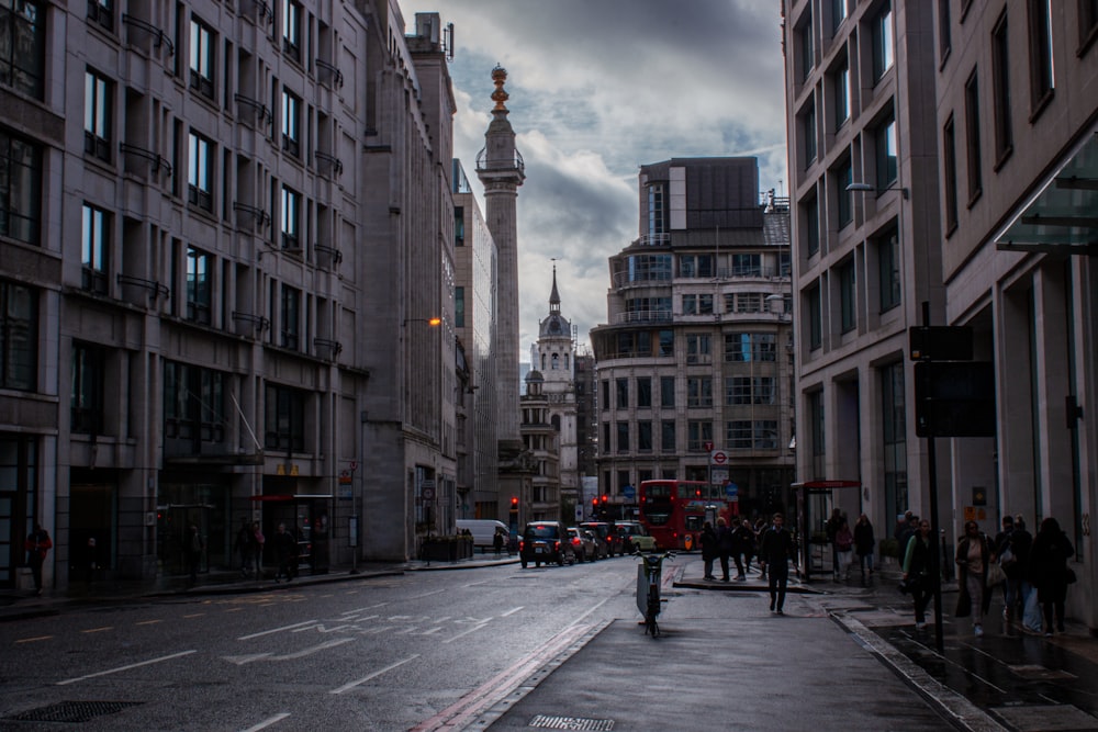 a city street filled with lots of tall buildings