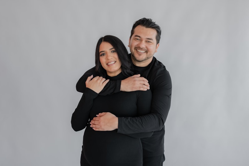 a man and a woman hugging each other