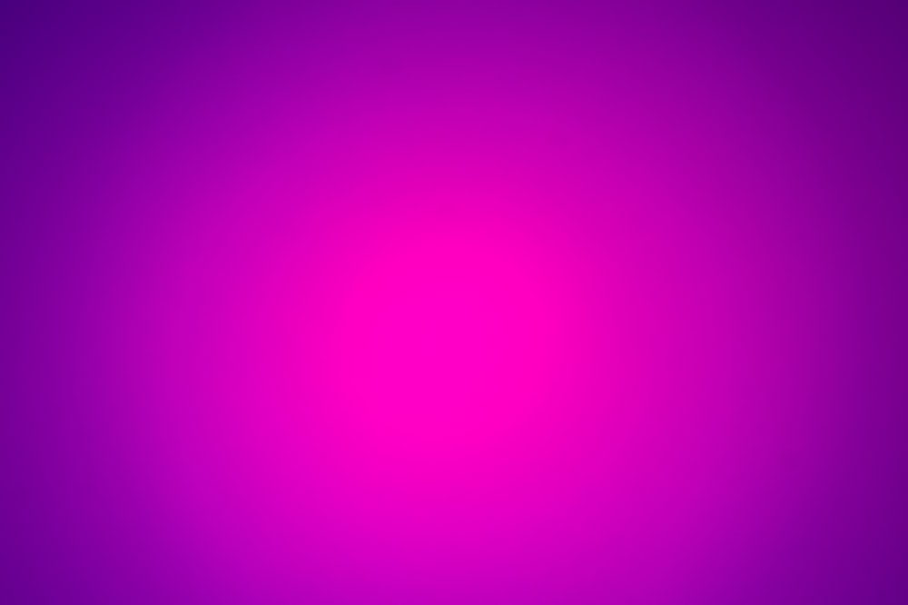 a pink and purple background with a black border