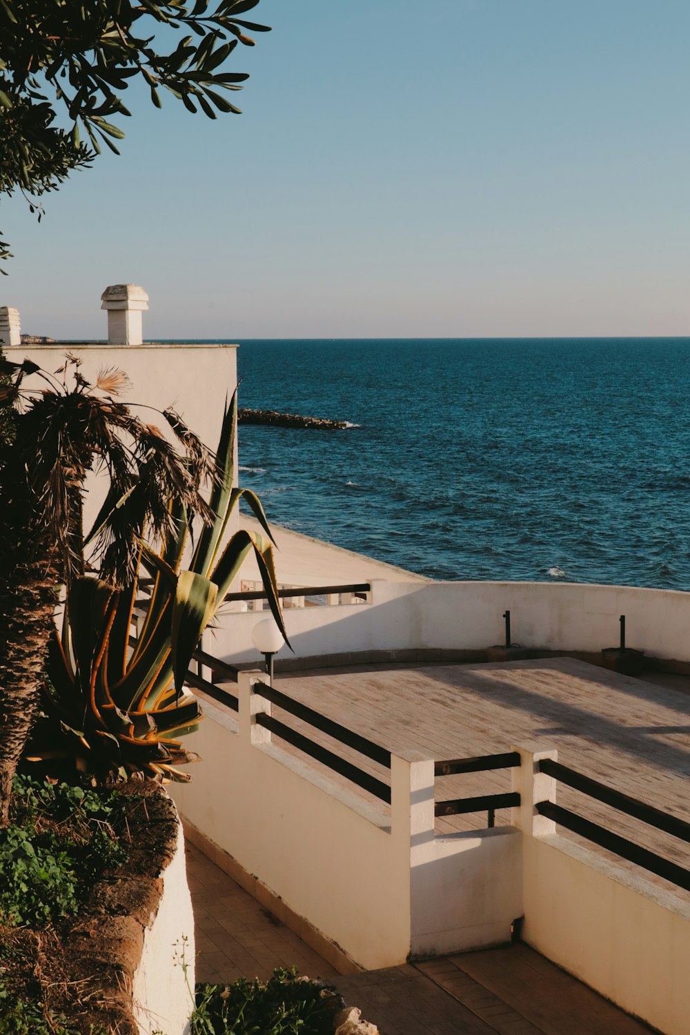 a view of a body of water from a deck