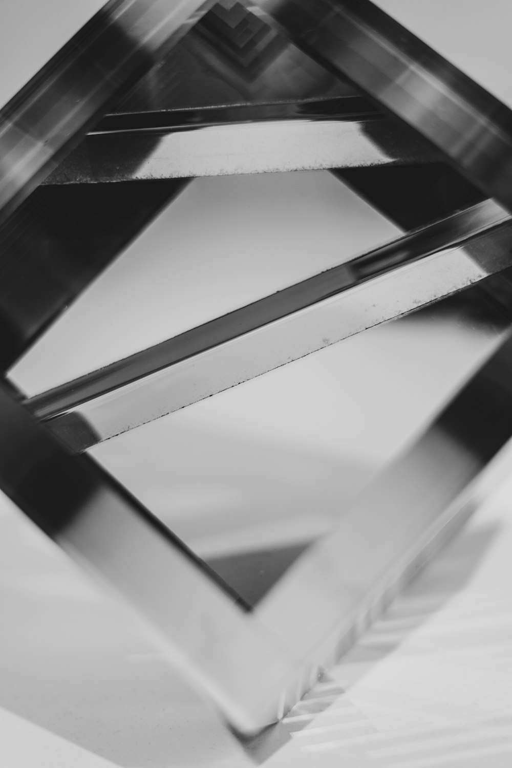 a black and white photo of a diamond