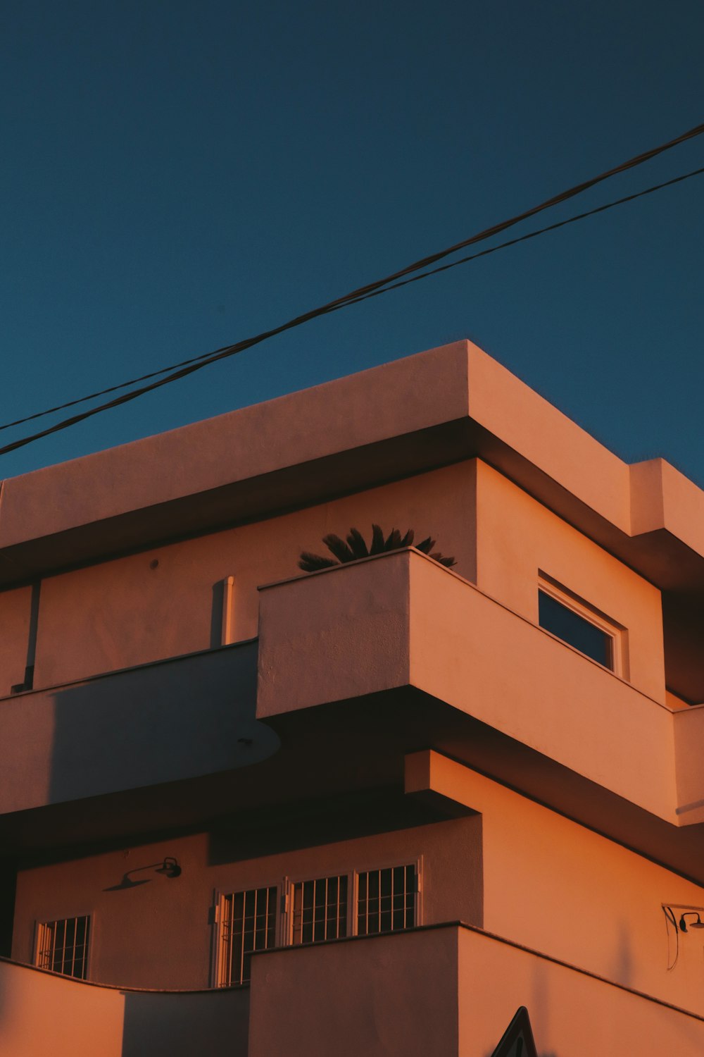 a tall building with a clock on the top of it