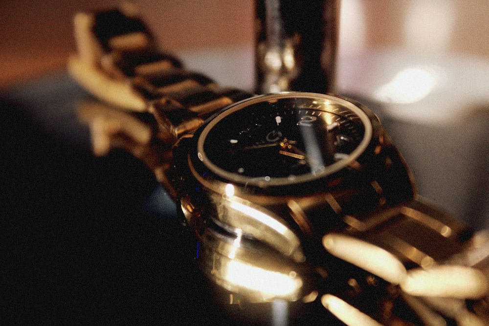 a close up of a watch on a table