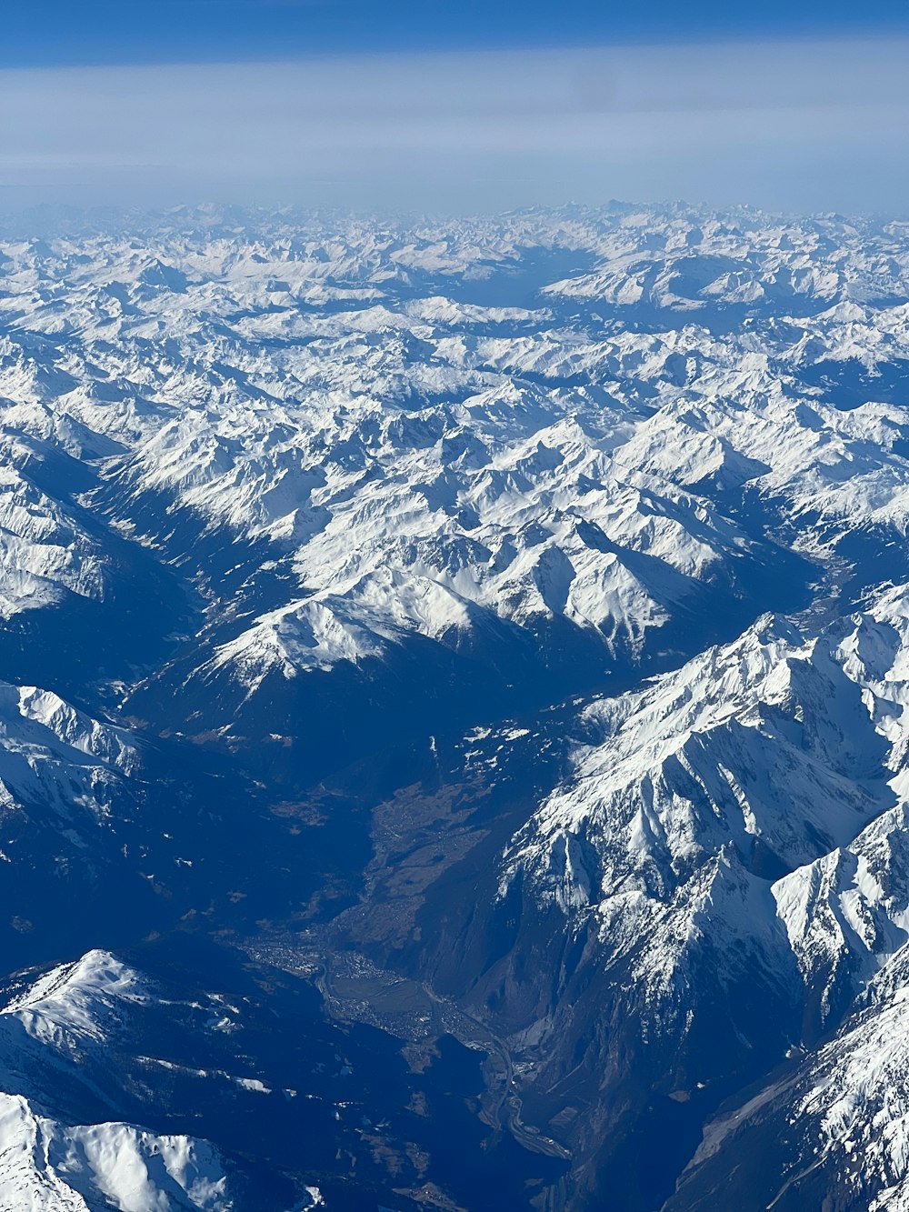 a view of the mountains from an airplane