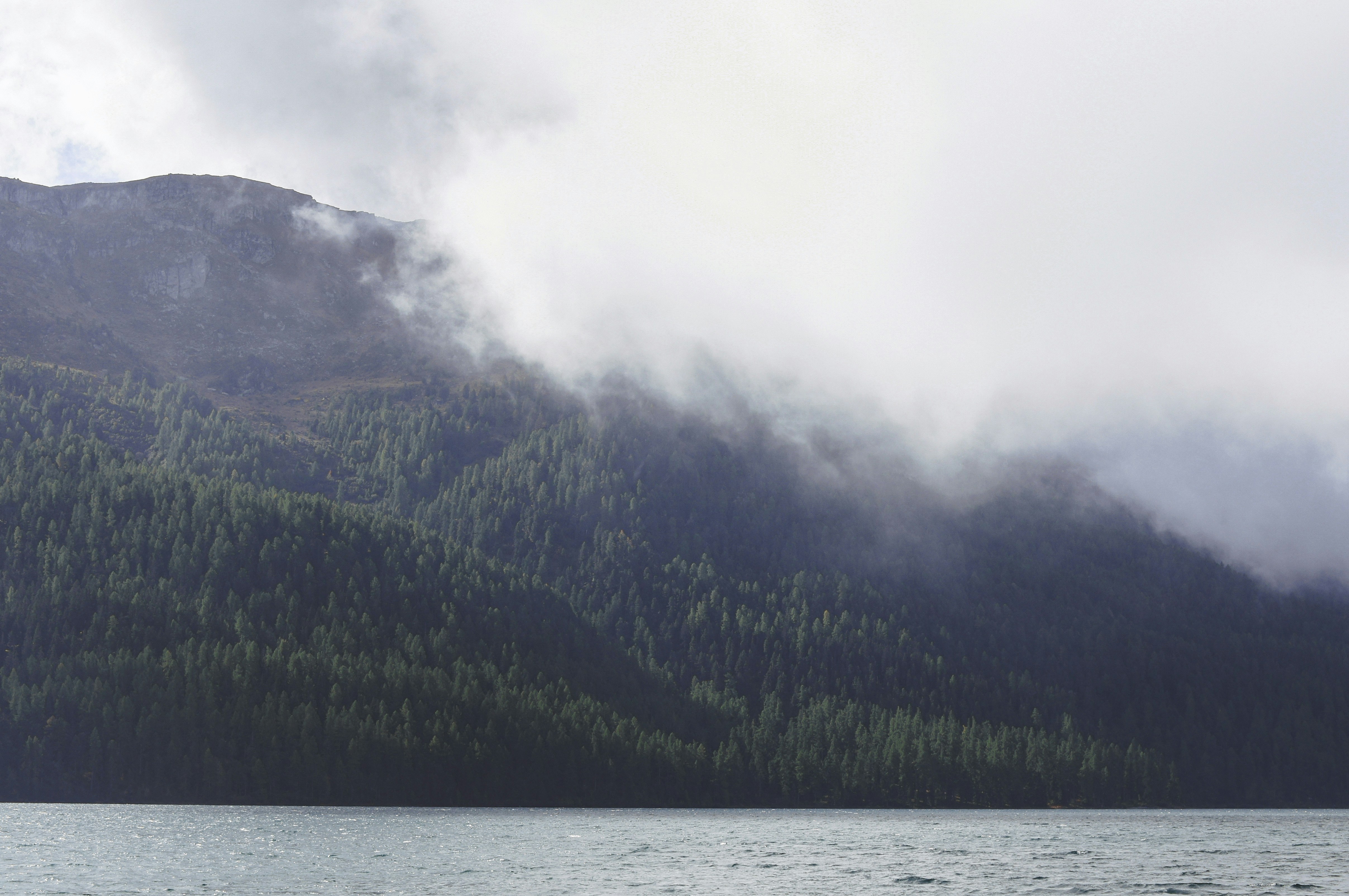 a large body of water surrounded by mountains