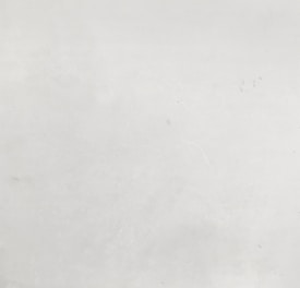 a black and white photo of a person on a surfboard