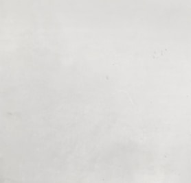 a black and white photo of a person on a surfboard