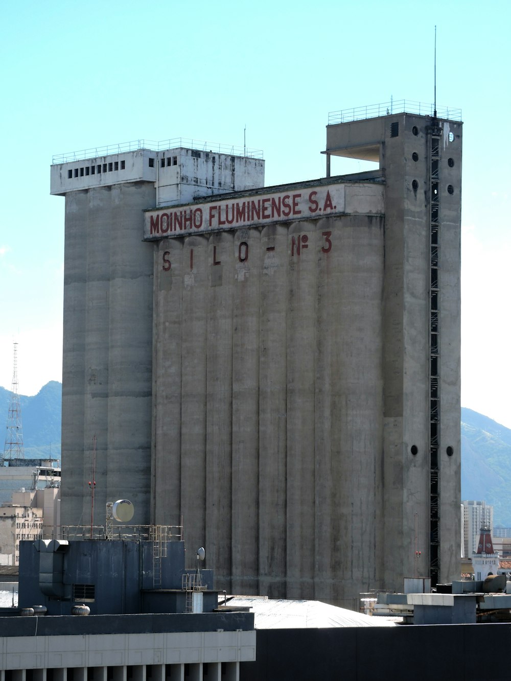 a tall building with a sign on the side of it