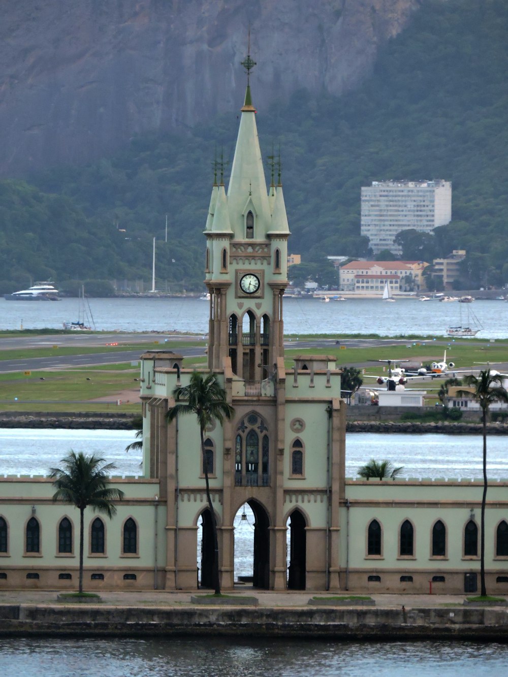 a large building with a clock on the top of it