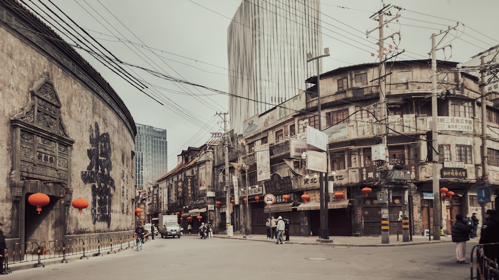 a city street filled with lots of tall buildings