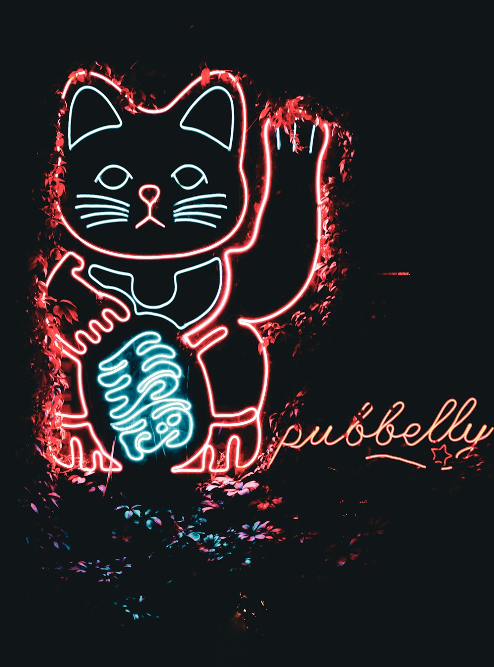 a neon sign that has a cat on it