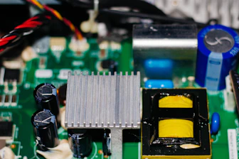 a close up of a computer motherboard with wires