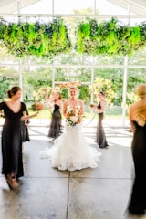 a group of women standing around each other