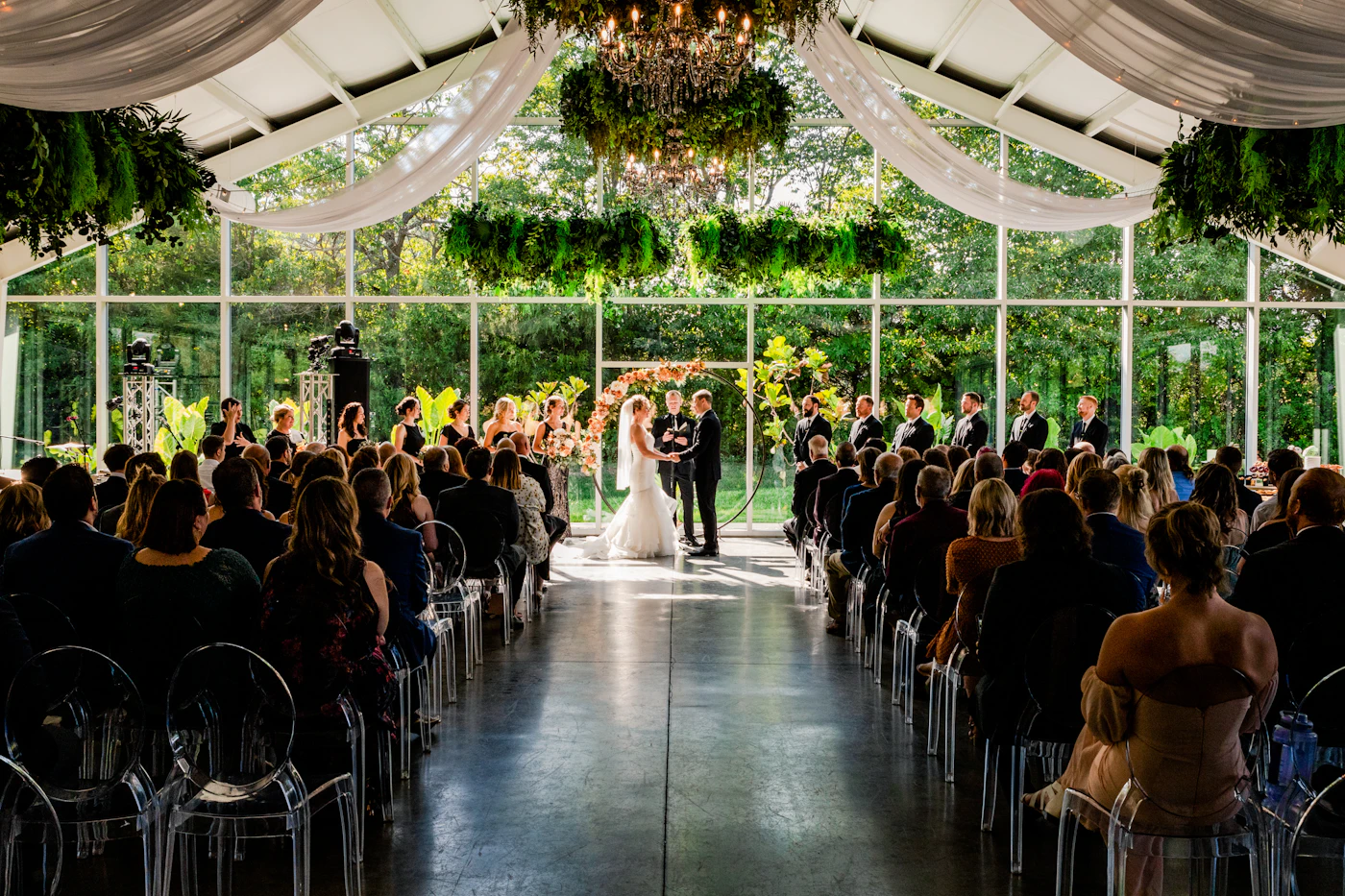 Wedding vendor insurance requirements checklist — A bride reviews vendor contracts at a reception venue