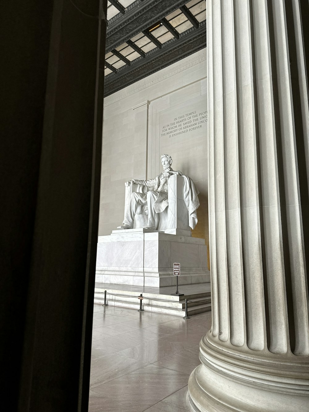 a view of the lincoln memorial through a window