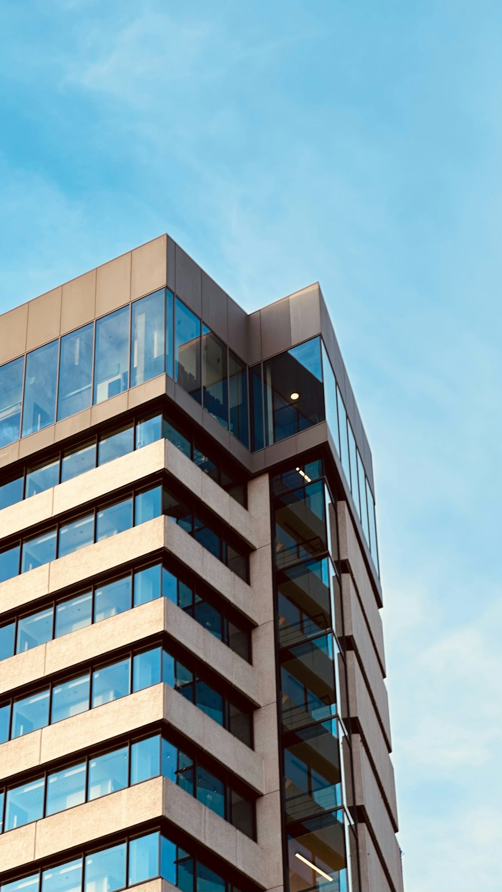 a tall building with a clock on the top of it