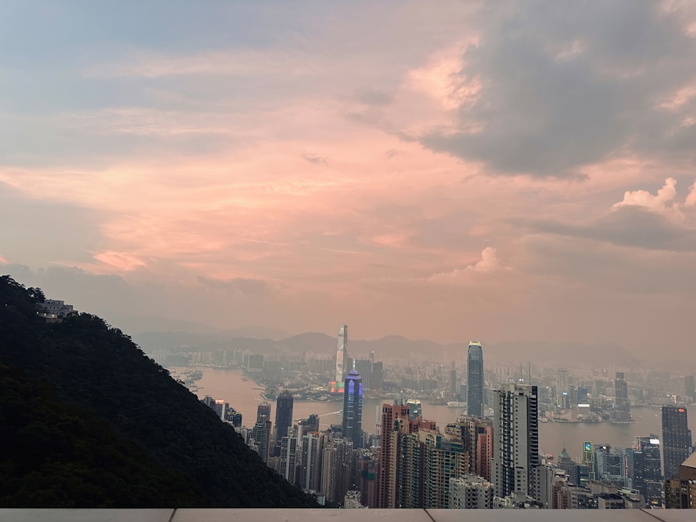 a view of a city from the top of a hill