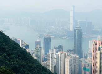 a view of a city from the top of a mountain