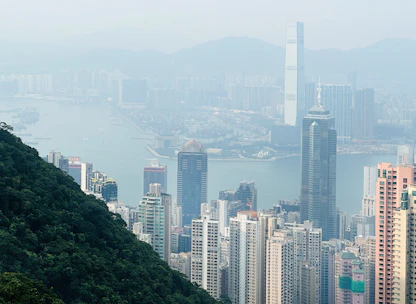 a view of a city from the top of a mountain