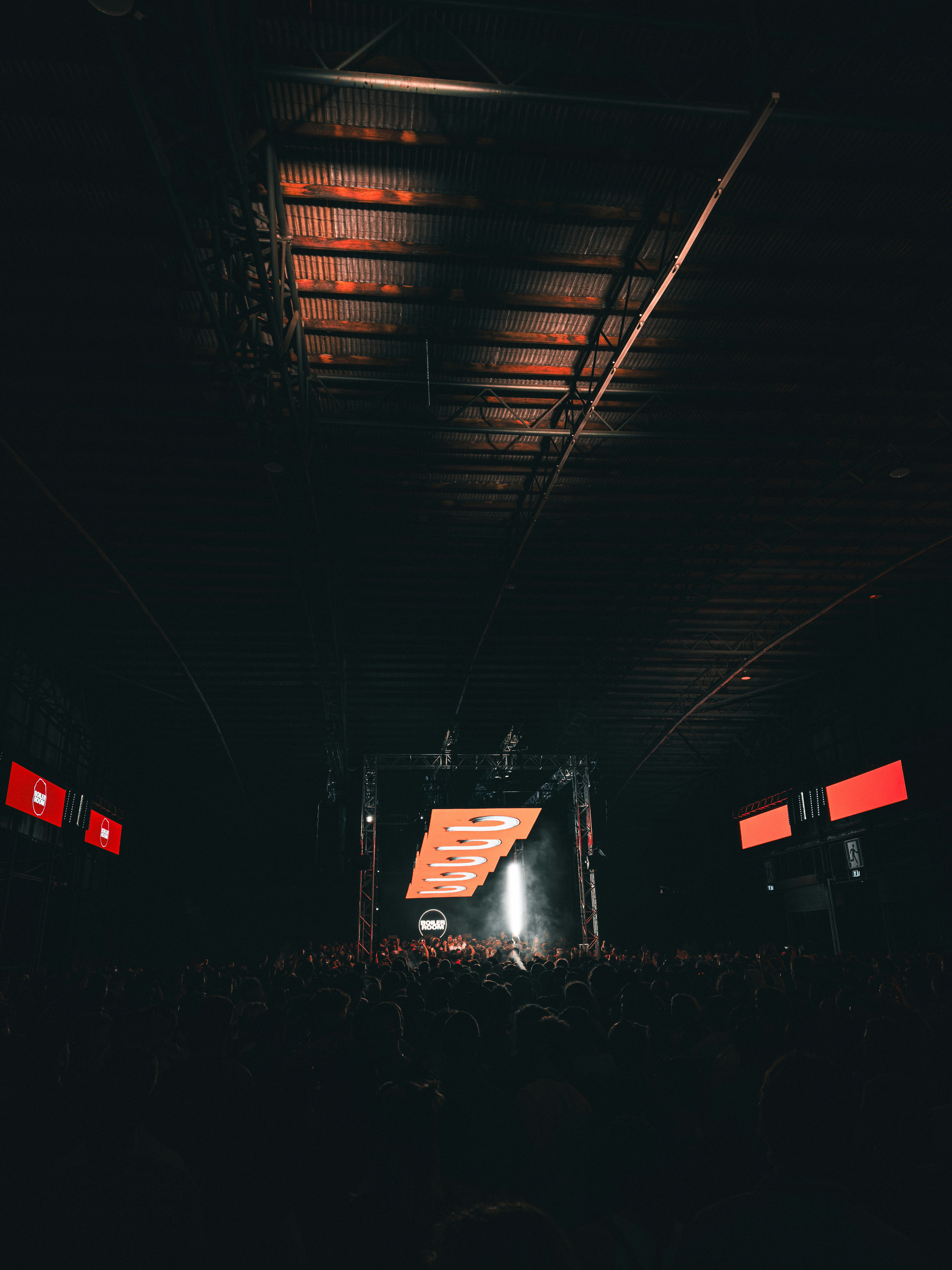 a group of people standing on top of a stage