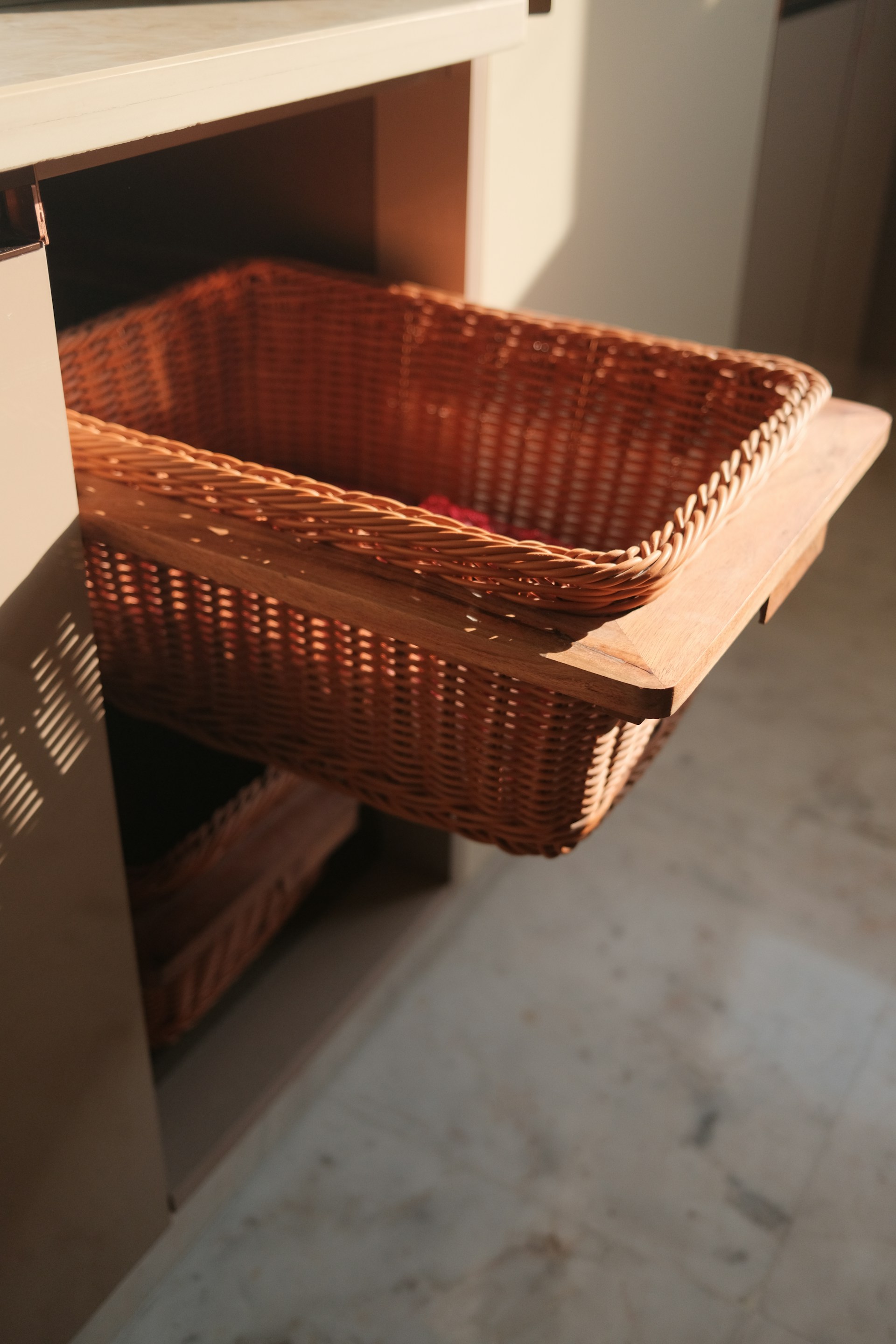 a wicker basket sitting on top of a counter