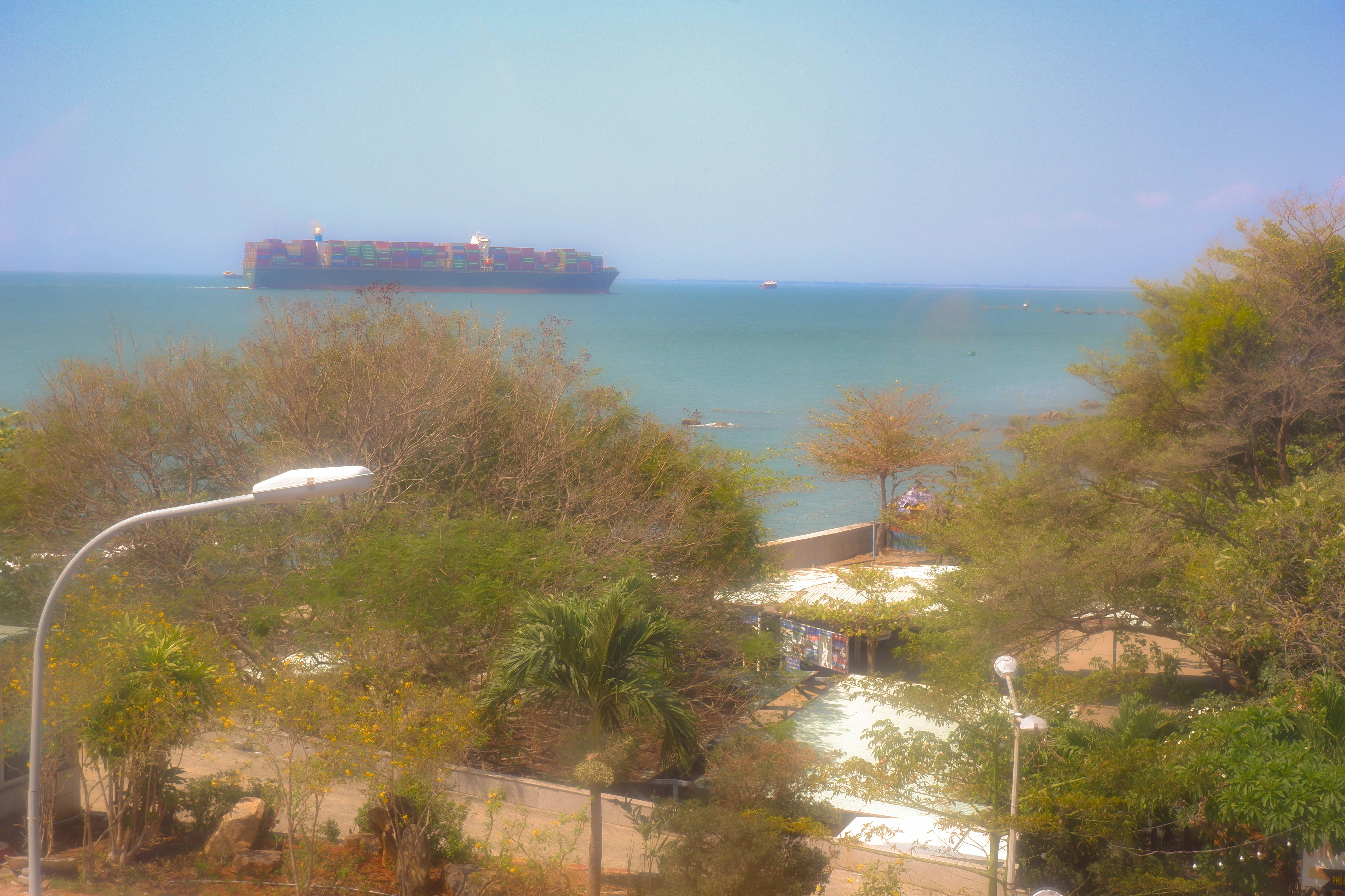 a large cargo ship is in the ocean