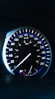 a close up of a speedometer in a car