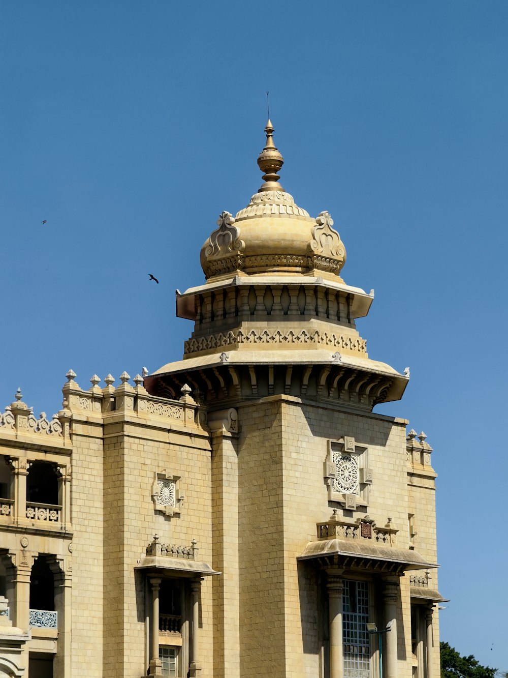 a tall building with a clock on the top of it