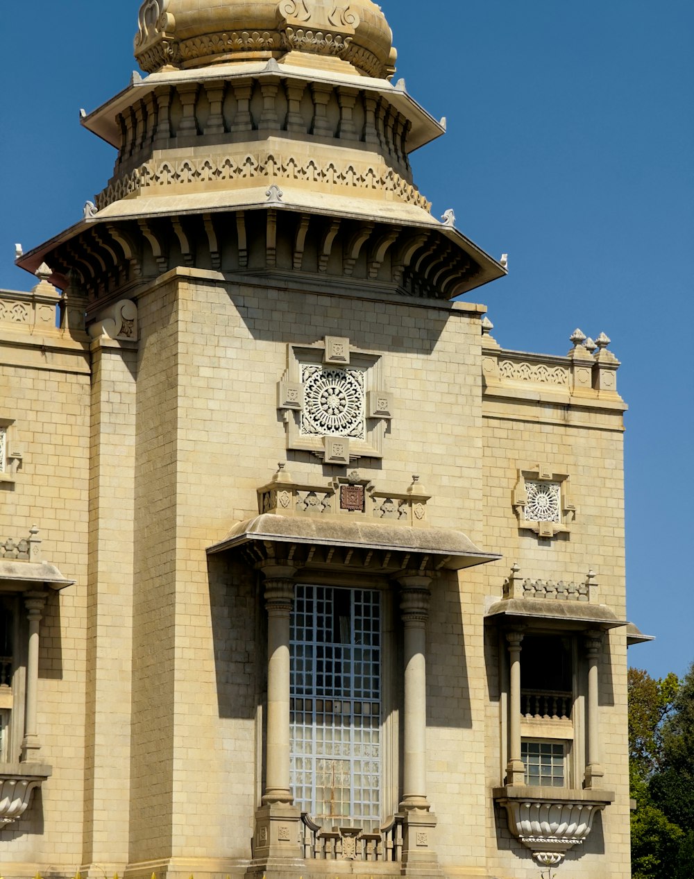 a tall building with a clock on the top of it